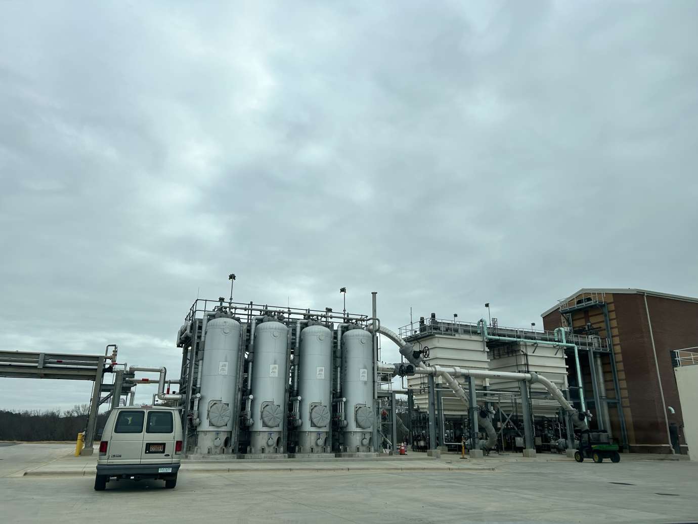 A van is parked in front of Raleigh's new bioenergy facility.