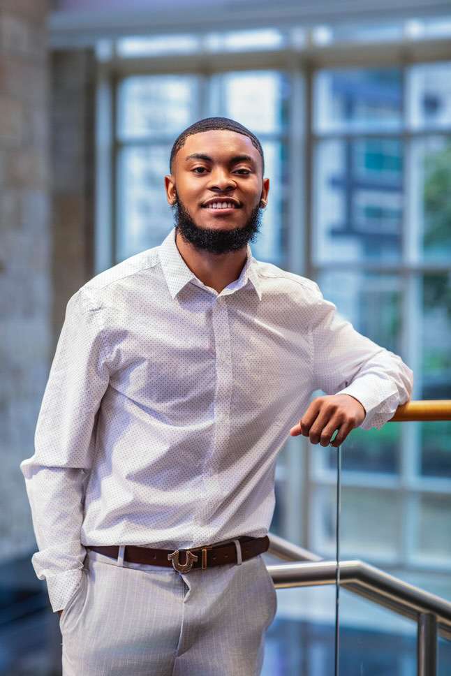 Young Black male poses for portrait