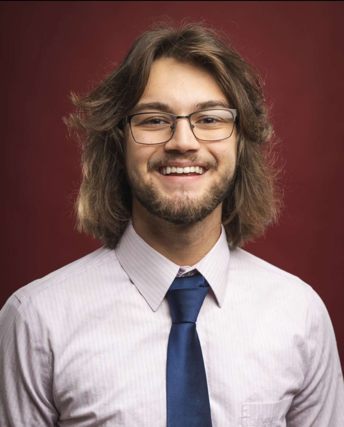 Young White man poses for portrait