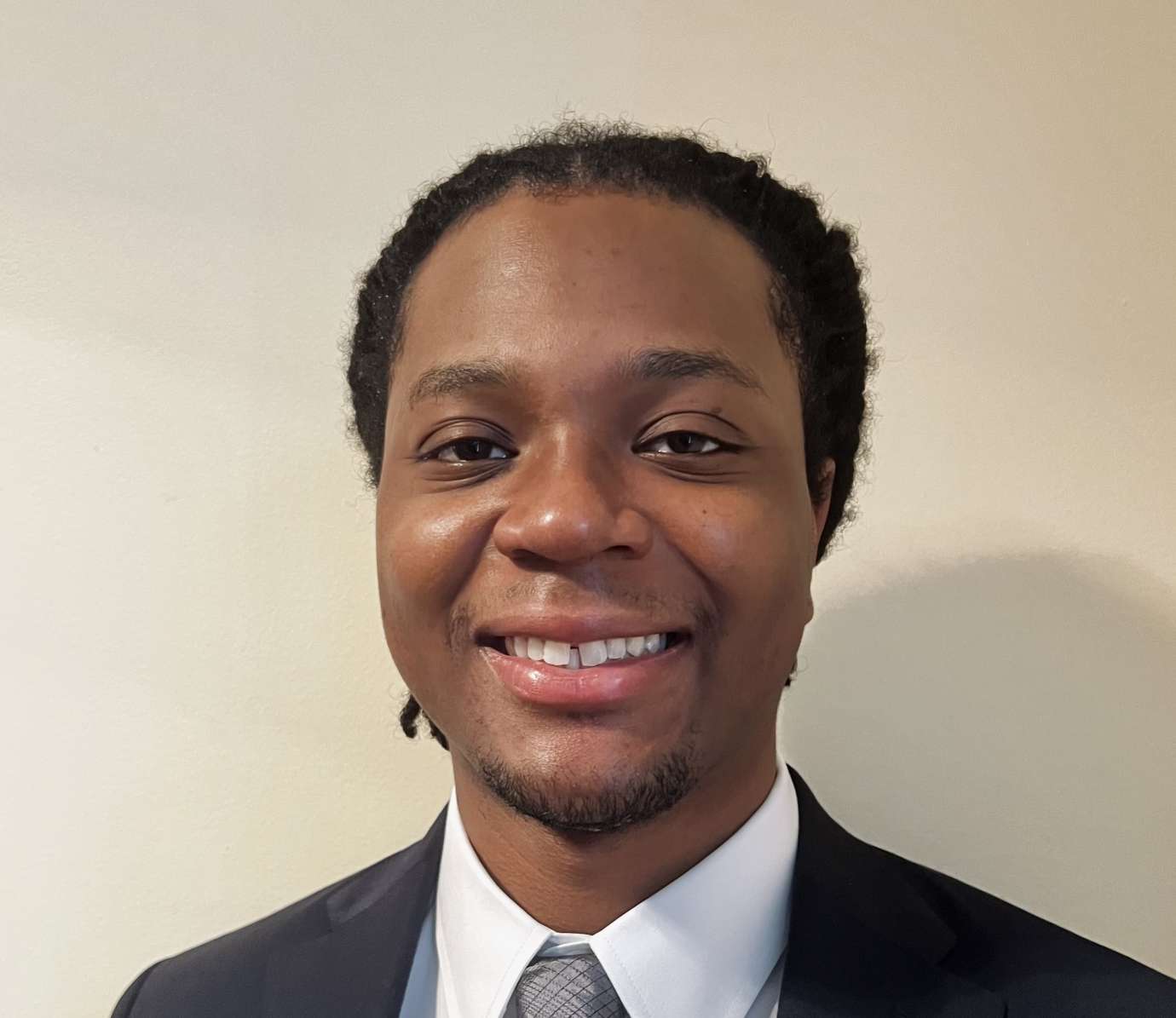 Young Black male poses for portrait