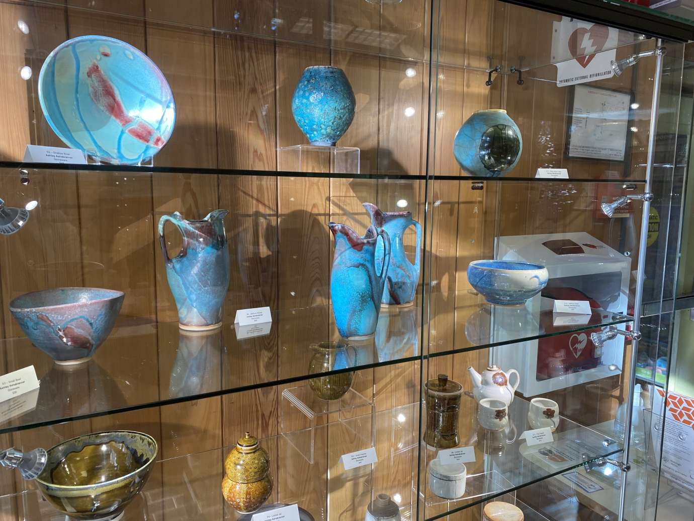 Ceramics in a glass display case 