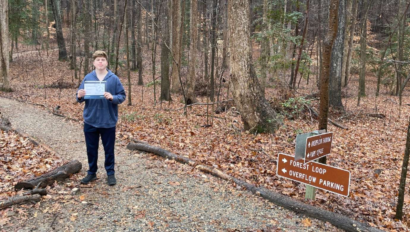 scout member with a certificate