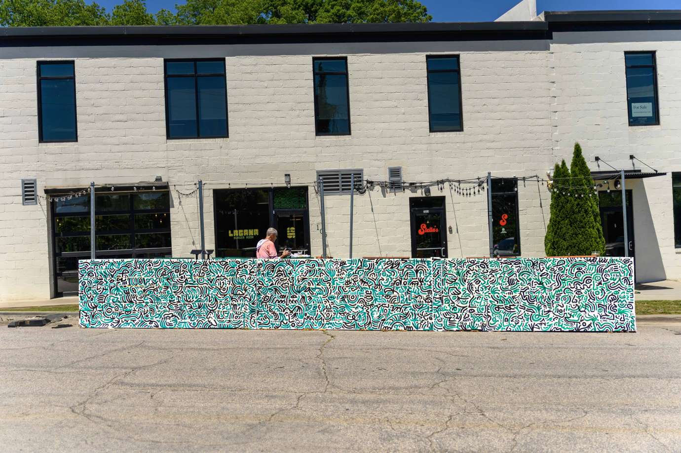 Street view of the mural on the streetery