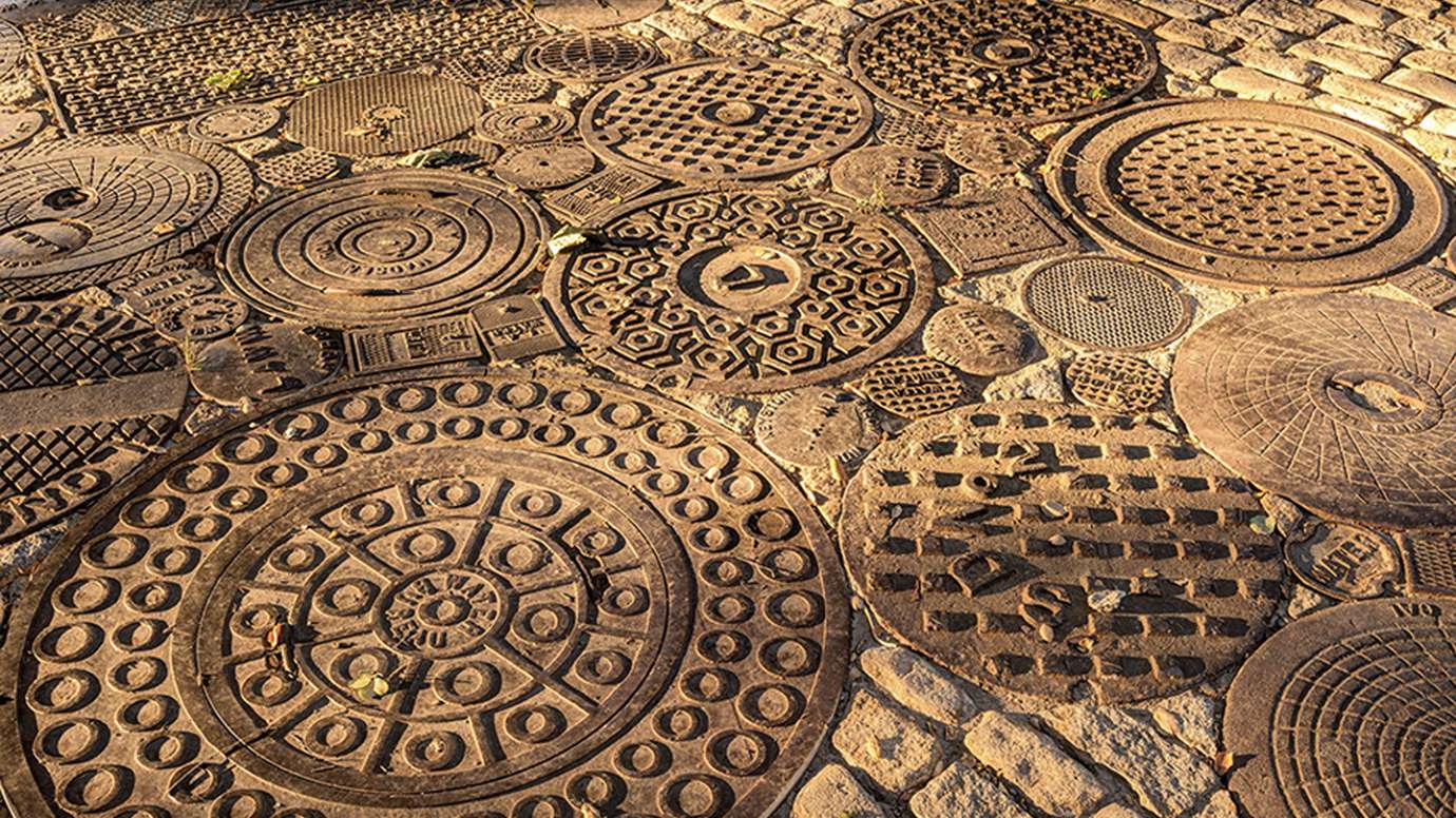 Closeup of multiple manhole covers
