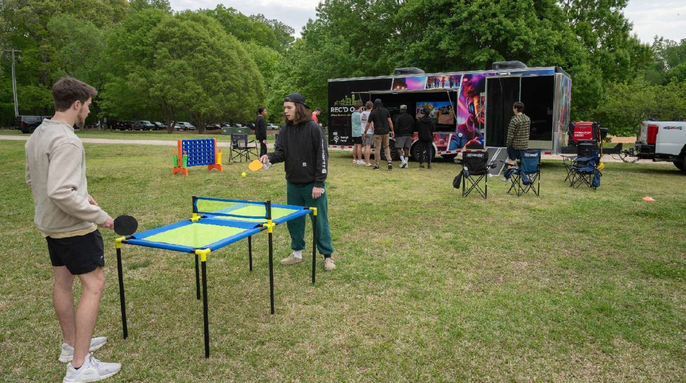 kids playing ping pong outside