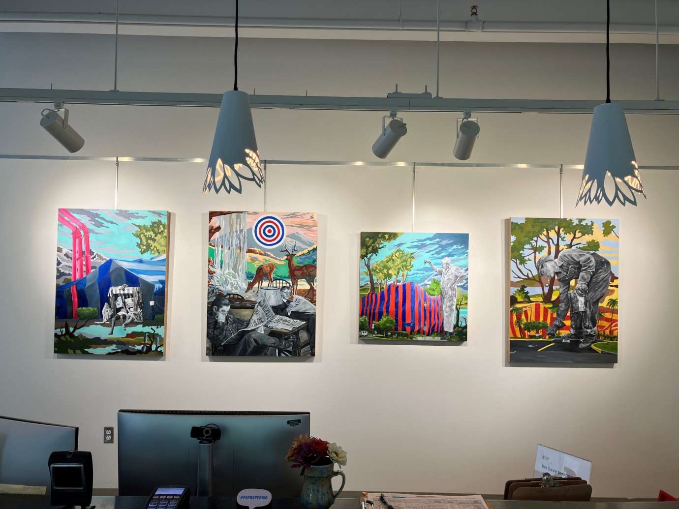 Gallery with artworks hung on the wall at Pullen Arts Center