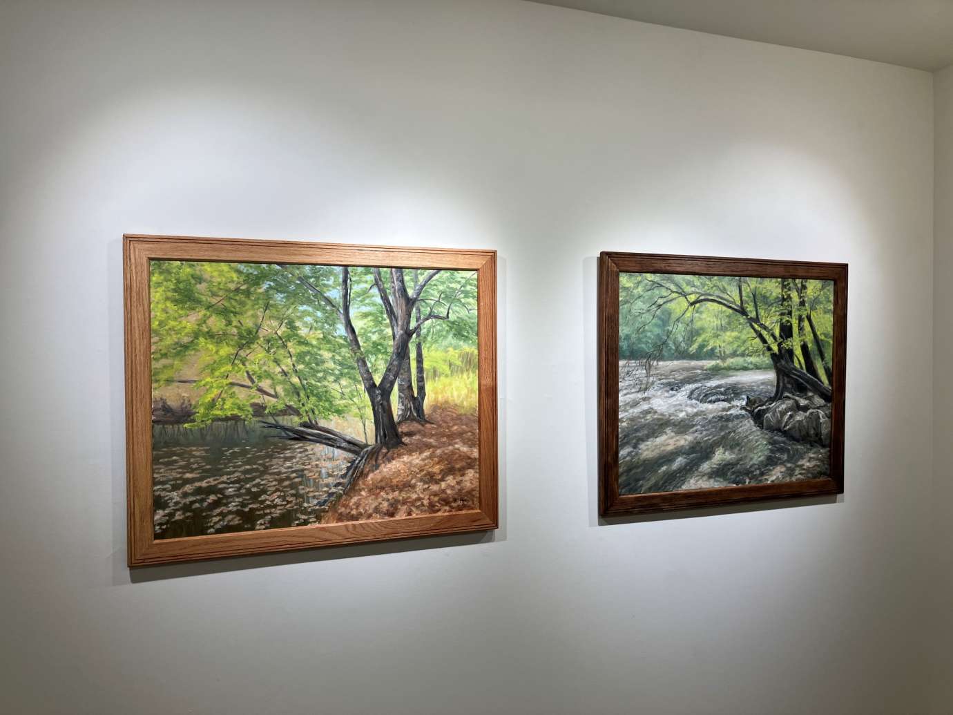 Gallery with artworks hung on the wall at Pullen Arts Center