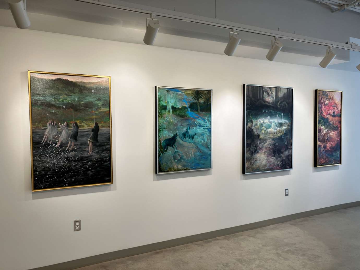 Gallery with artworks hung on the wall at Pullen Arts Center