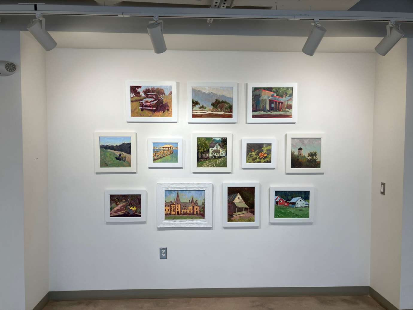 Gallery with artworks hung on the wall at Pullen Arts Center
