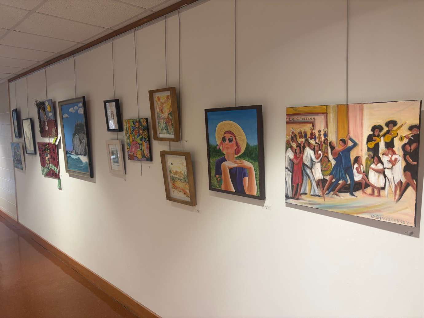 2D Mixed Media Artwork hanging on a white wall 