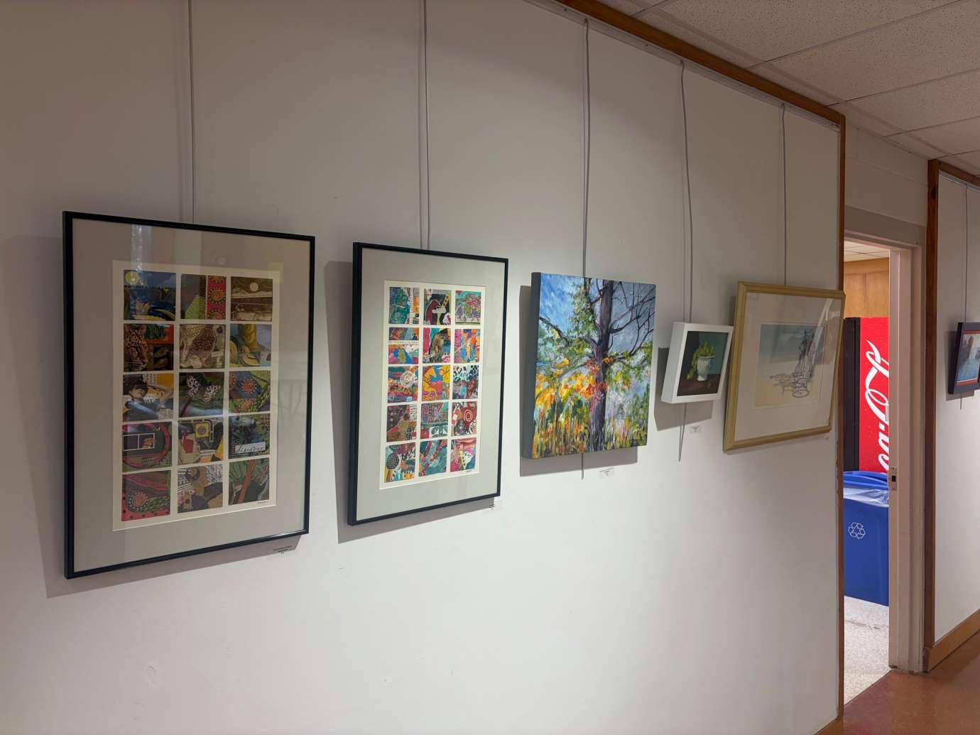 2D Mixed Media Artwork hanging on a white wall 