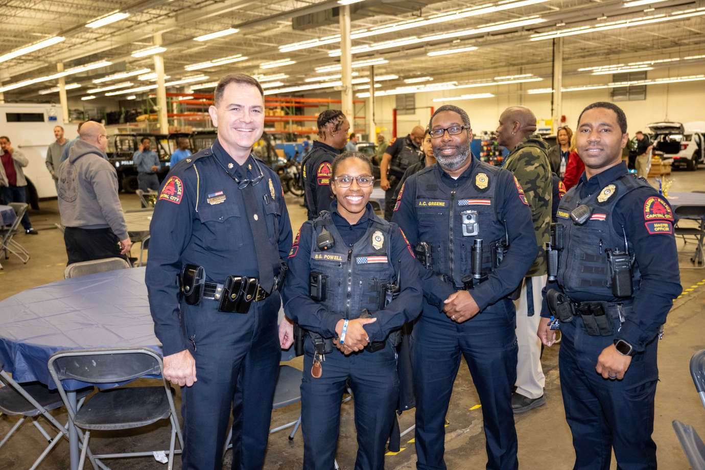 Four police officers smiling