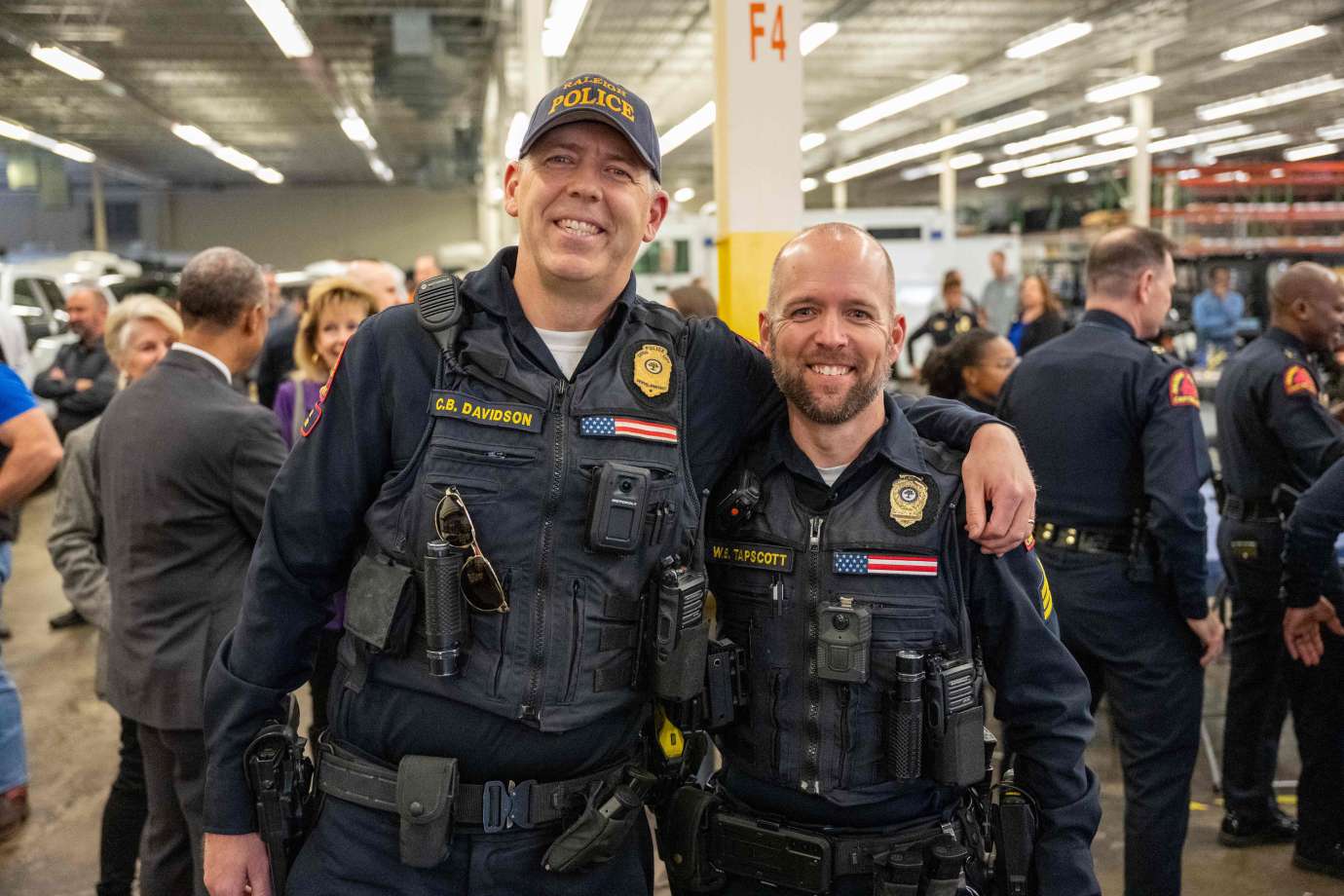 Two police officers standing side by side
