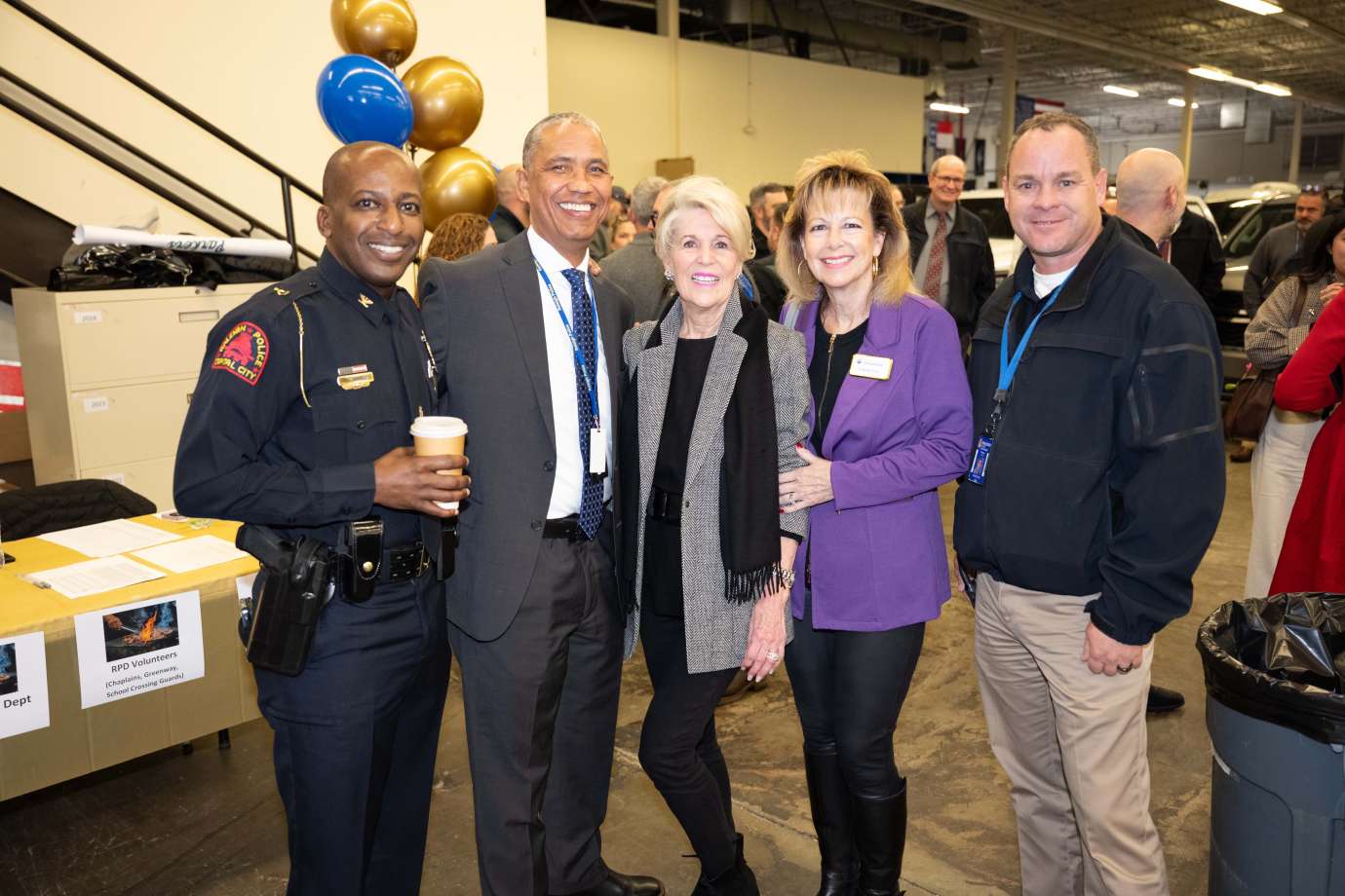 RPD Chief and event attendees standing together