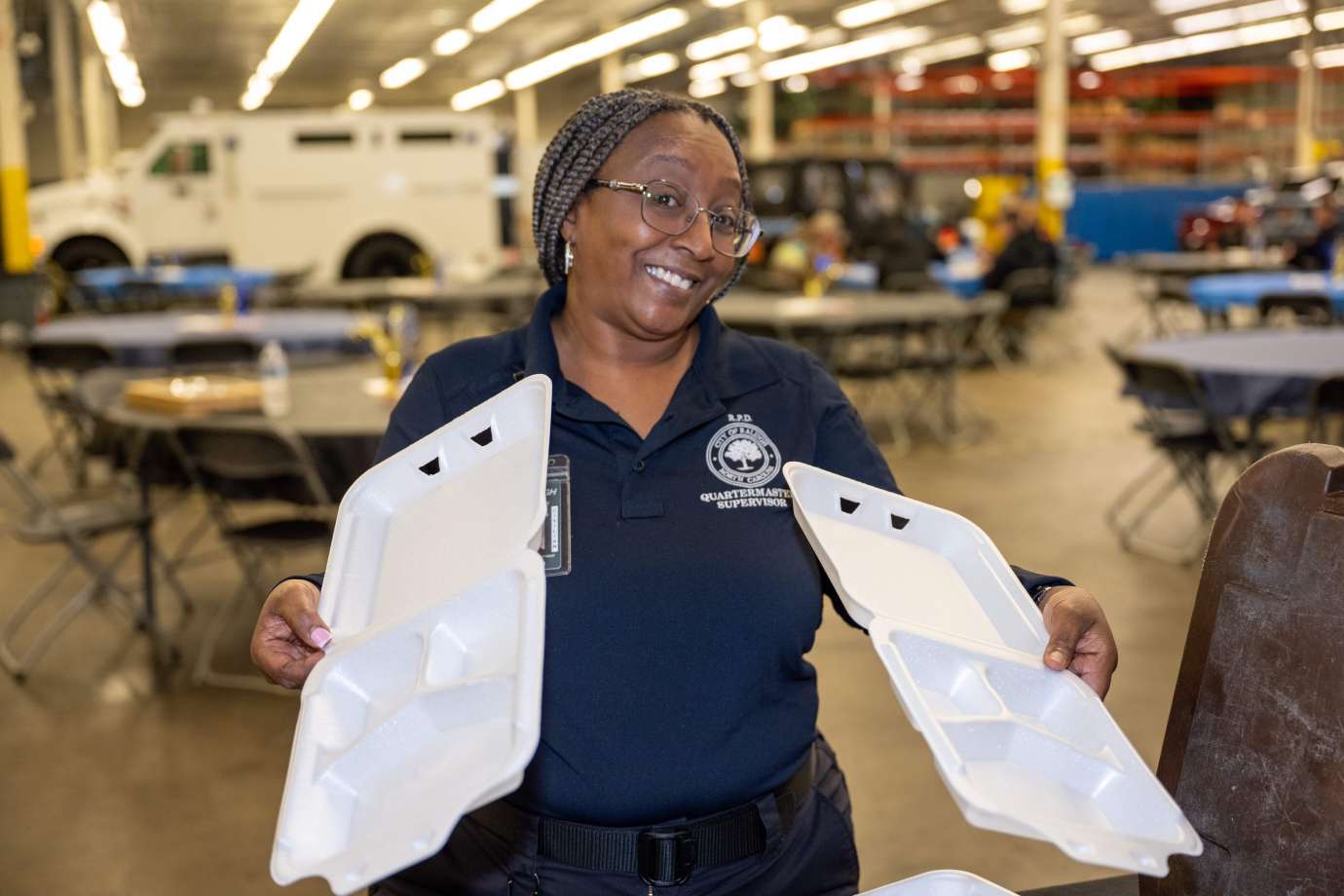 Person holding styrofoam container