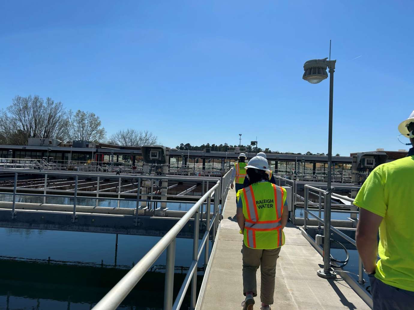 worker walking down water plant