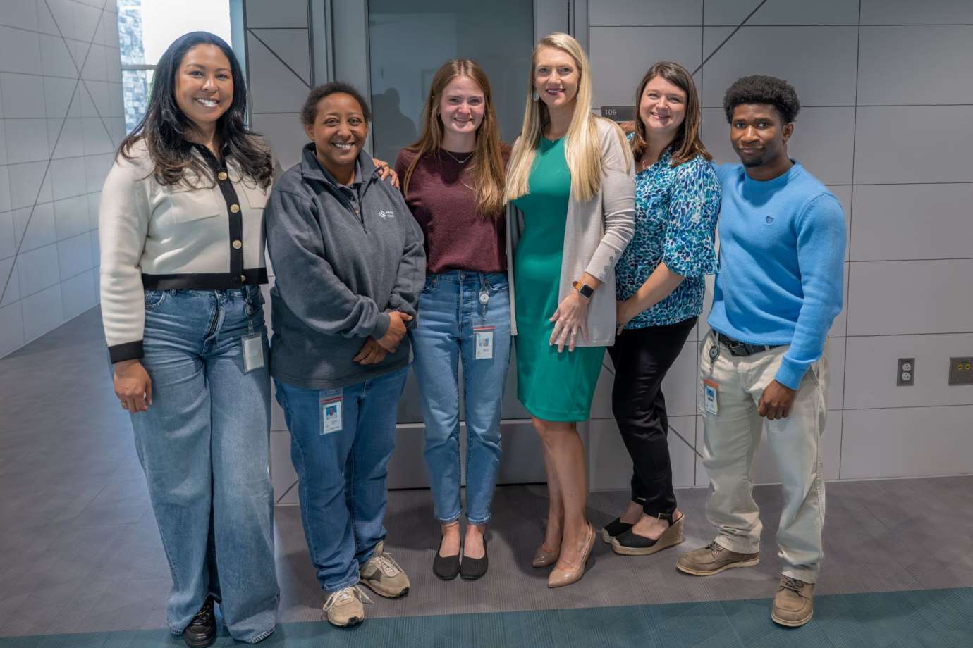 Group of six water lab workers standing together