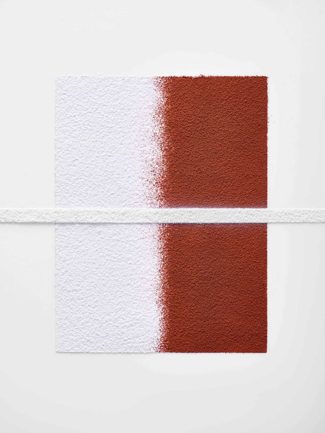 Brown and white rectangle intersected by white line in middle