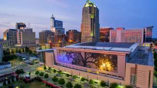 aerial shot of the Raleigh Convention Center at twilight