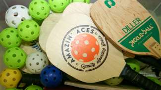 Pickleball paddles and balls