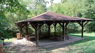 smaller square picnic shelter at Chavis Park with tables