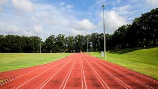 track lanes with grassy field at chavis park