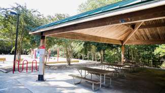 A large outdoor picnic shelter at Baileywick Park next to the playground