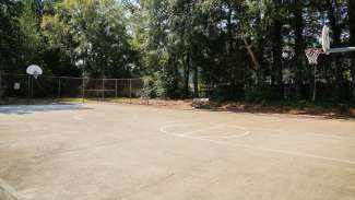 empty outdoor basketball court at millbrook park