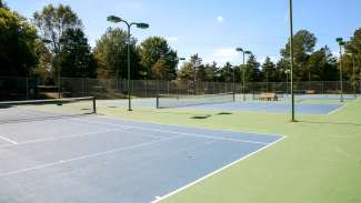Outdoor tennis courts at Spring Forest Road park