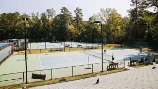View of four tennis courts at once Millbrook Exchange Park