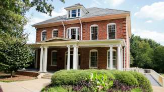 A large brick house that can be rented for special events 