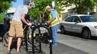 Man using bike rack 