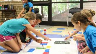 Kids participating in an art program at Optimist 