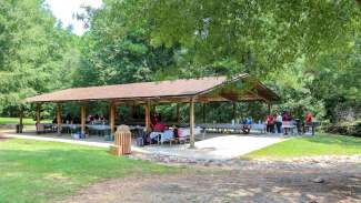 party under a picnic shelter at Lake Wheeler