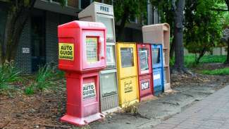 row of newsboxes