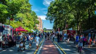 People out enjoying springfest vendors on hillsborough street