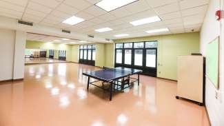 A large open room that can be separated and used for meetings or classes