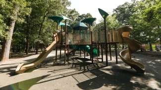 A second larger playground for older kids with more advanced equipment