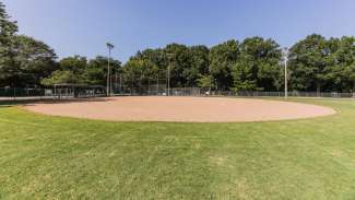 A second softball field with backstop 
