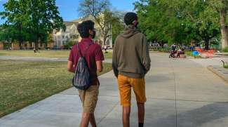 Teens on a walking tour outside in Raleigh