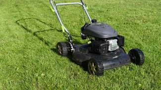 Lawn mower on the grass