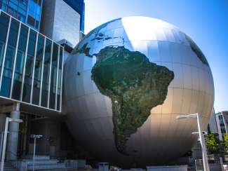 The largest globe replica sits outside the NC Museum of Natural Sciences