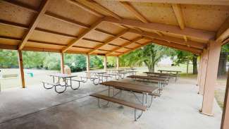 Picnic shelter with 8 picnic tables