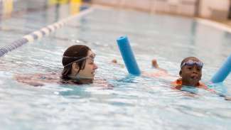 Instructor and child during swim lesson