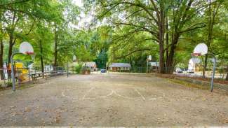 Neighborhood basketball court with four hoops