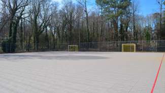 fenced in outdoor futsal courts