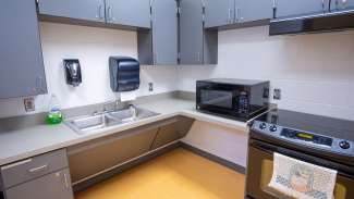 image of a kitchen with oven microwave