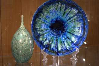 ceramic vessel and platter with blue and brown crystalline glazes