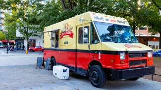 an image of a food truck on the street