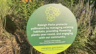a Raleigh Parks pollinator protection sign